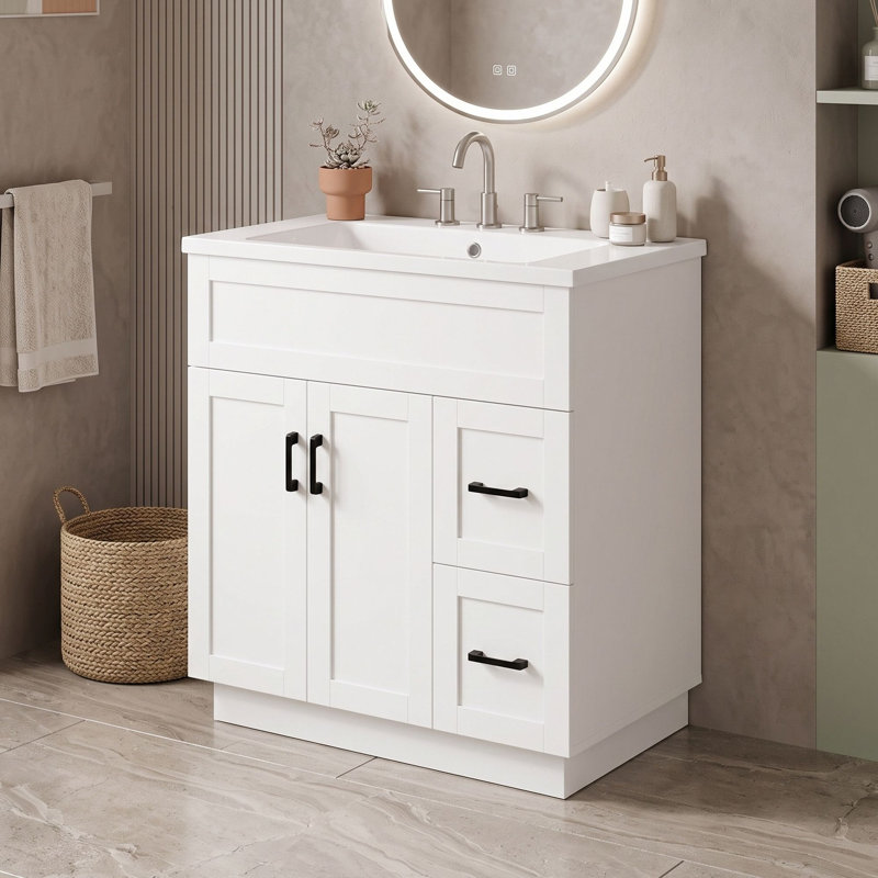 Meuble-lavabo avec lavabo en résine, 2 tiroirs à fermeture amortie, tablette réglable et dos ouvert pour faciliter l'accès à la plomberie.