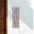 19" X 6" Gray and Brown Handcrafted Joy Metal Wall Decor