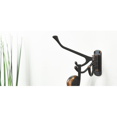 Crochet mural pivotant utilitaire