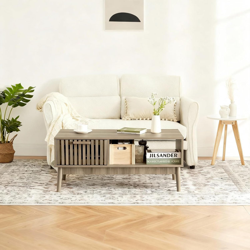 Table basse cannelée, ferme moderne avec tablette ouverte et rangement de tiroir, finition grain de bois pour le salon