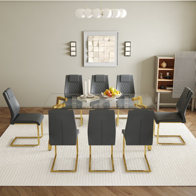 Ensemble de table et de chaises. Table de salle à manger rectangulaire de 71,4 po x 35,4 po. Plateau de table en verre trempé, 7 pieds de table en métal.