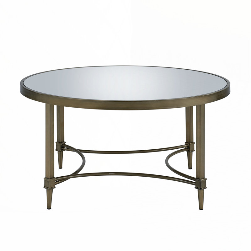 Table basse à finition miroir et laiton antique