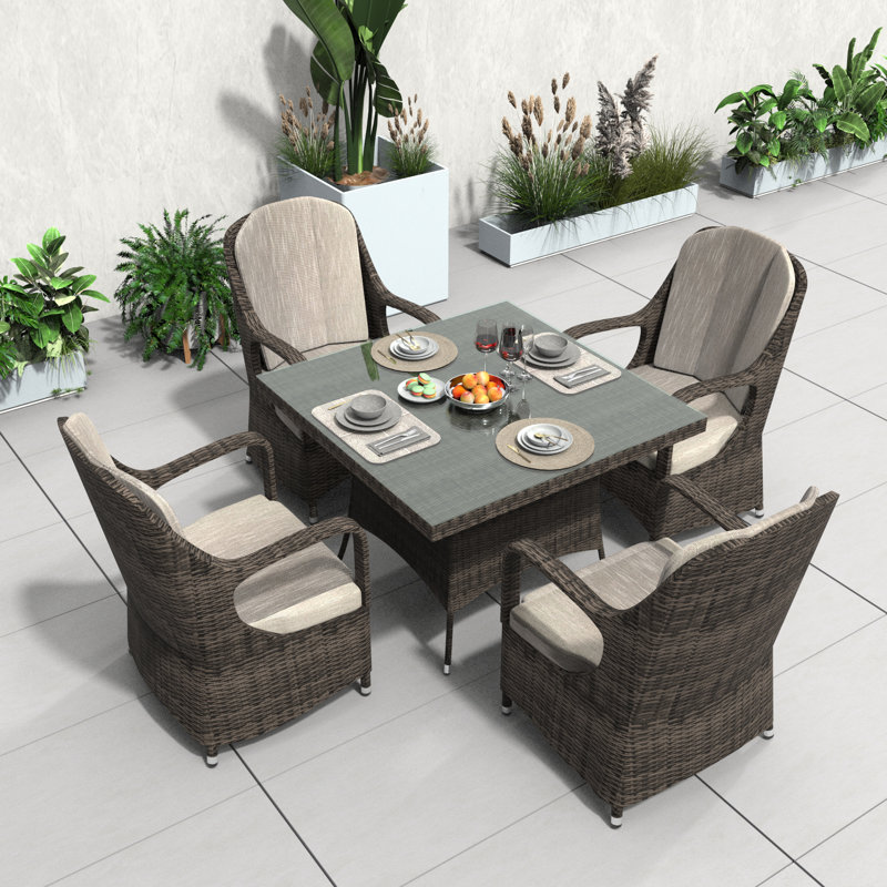 Algird 4 - Person Wicker Patio Dining Set with Square Table , Cushions Included, 28.35" H x 39.37" L x 39.37" D
