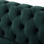 Luxueux canapé-lit rembourré en velours avec bouton capitonné, parfait pour des conversations relaxantes et des séances de lecture confortables