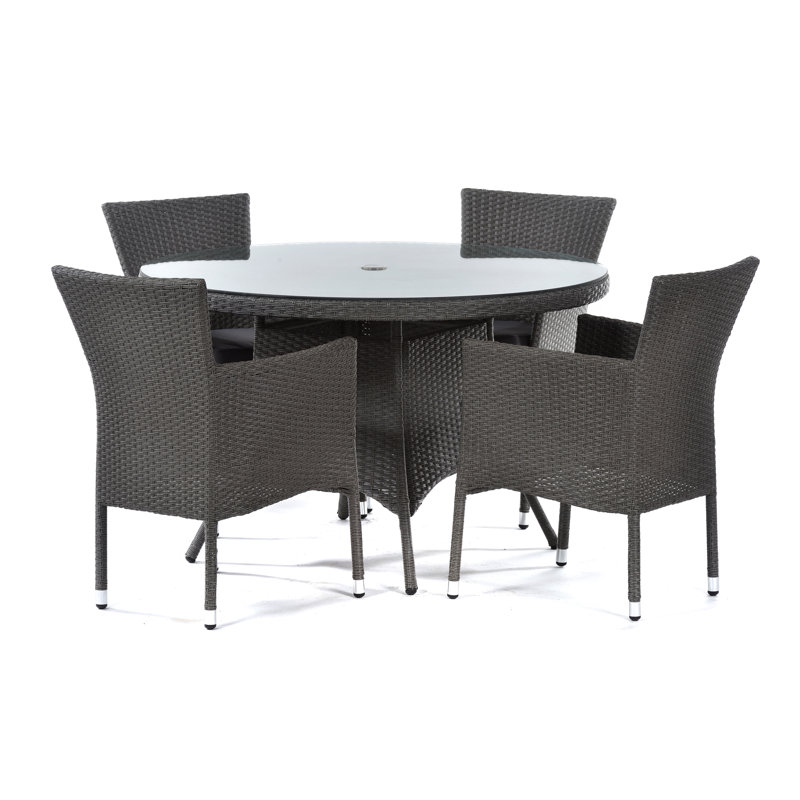 Bierman 4 - Person Patio Dining Set Round Table with Cushions Included