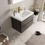 Meuble-lavabo de 30 po avec lavabo. Espace de rangement flottant gris cendré. Pré-assemblé pour plus de commodité. Organisation intérieure en forme de U. Comptoir en résine de pierre. Mécanisme de tiroir à fermeture silencieuse.