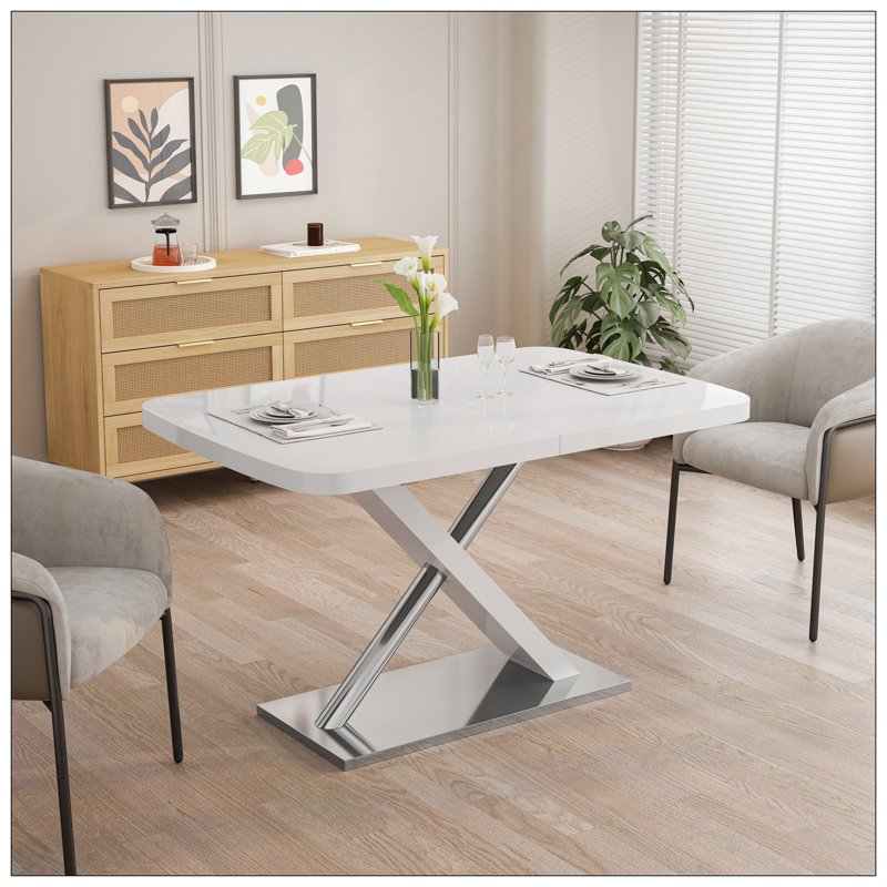 Table de salle à manger moderne avec conception extensible et base en métal robuste pour les réunions de famille