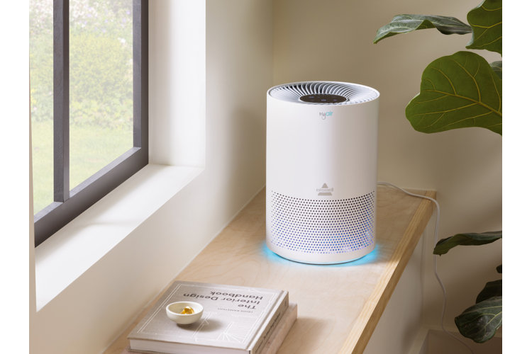 tabletop air purifier on a modern windowsill