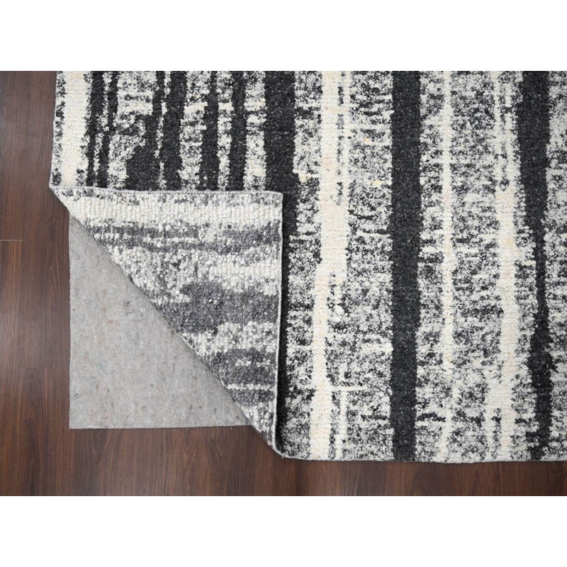 Tapis oriental rectangulaire noir en laine noué à la main 8 pi 3 po x 10 pi 0 po - MOA10284209