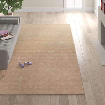 Tapis beige en laine Ameia