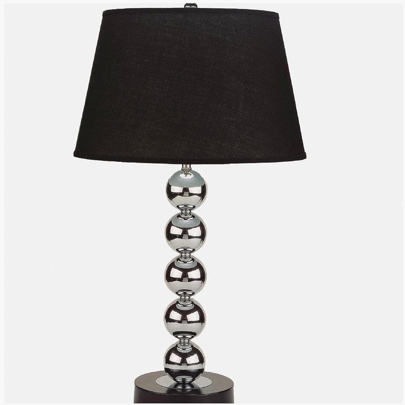 2 modern minimalist table lamps with reflective spheres attract attention in black and silver