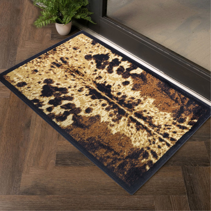 2 pi 7 po X 3 tapis en polypropylène noir à motif de peau de vache teinté pour les espaces très passants et les poils de 0,38 po