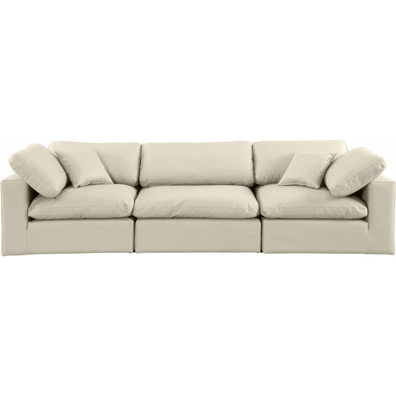 Hygema Upholstered 119'' Sofa, Cream Vegan Leather