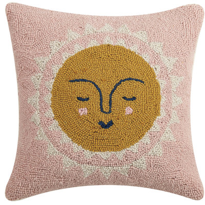 Coussin en laine soleil