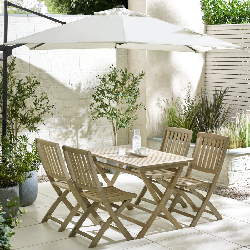Ronja Rectangular Wooden Garden Dining Table With 4 Foldable Dining Chairs