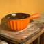 Set of Matt orange reactive glaze handled bowls small and large