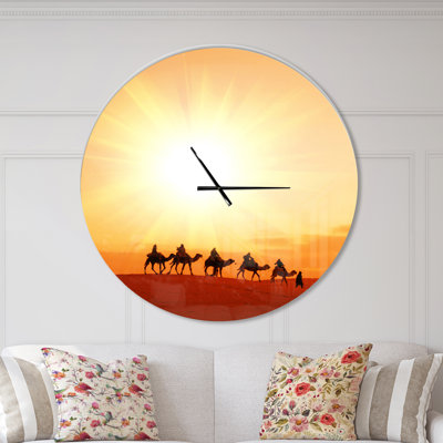 Caravane dans le désert du Sahara - horloge murale moderne