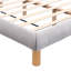 Structure de lit plateforme double avec revêtement en chenille grise et tête de lit tapissier attrayante, offrant une expérience de sommeil cocooning