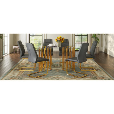 Table and chair set.71 inch oval tempered glass dining table,gold double column light luxury style,Dark Gray High-quality PU Chairs With Golden Arched