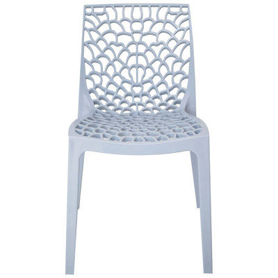 Gruvyer Spider Web Design Indoor Outdoor Stacking Plastic Dining Chairs - 4 Chairs