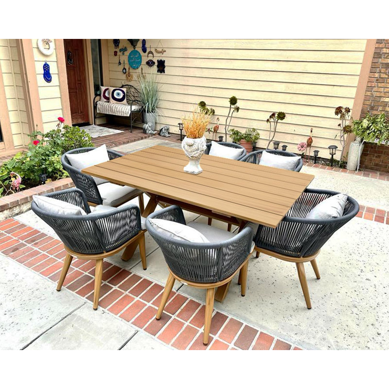 Braylin 6 - Person Wicker Patio Dining Set with Rectangular Table , Cushions Included