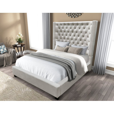 Cannonville Upholstered Wingback Bed