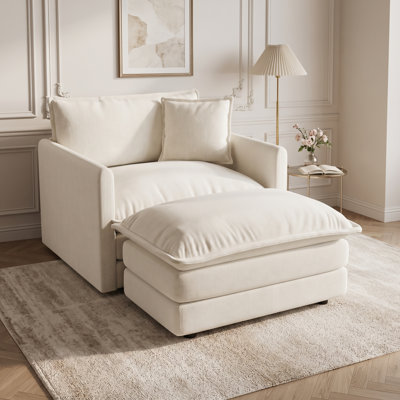 Chaise longue rembourrée avec repose-pieds assorti et coussins moelleux, blanc crème