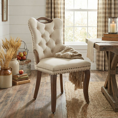Chaise de salle à manger en velours avec garniture touffetée à la main, poignées en bois massif, décoration cloutée en cuivre rétro, pieds en bois massif courbé