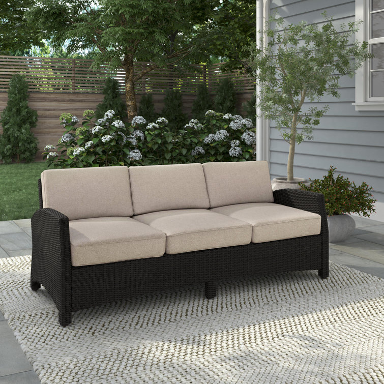 https://assets.wfcdn.com/im/51285165/resize-h755-w755%5Ecompr-r85/1992/199270532/Ambria+81%27%27+Wicker+Outdoor+Patio+Sofa.jpg