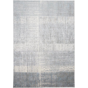 Caniyah Abstract Power Loom Beige Area Rug