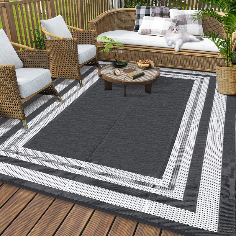 Outdoor Area Rug 10' x 14' Reversible Waterproof Polypropylene Patio Mat with UV Fade Resistance and Corner Loops for Deck, Balcony, Camping or Beach Use