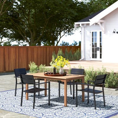 Anautica 4 - Person Teak Solid Wood Patio Dining Set Umbrella Hole Included Rectangular Table