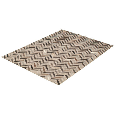 Jeraldene Cowhide Patchwork Indoor Rug