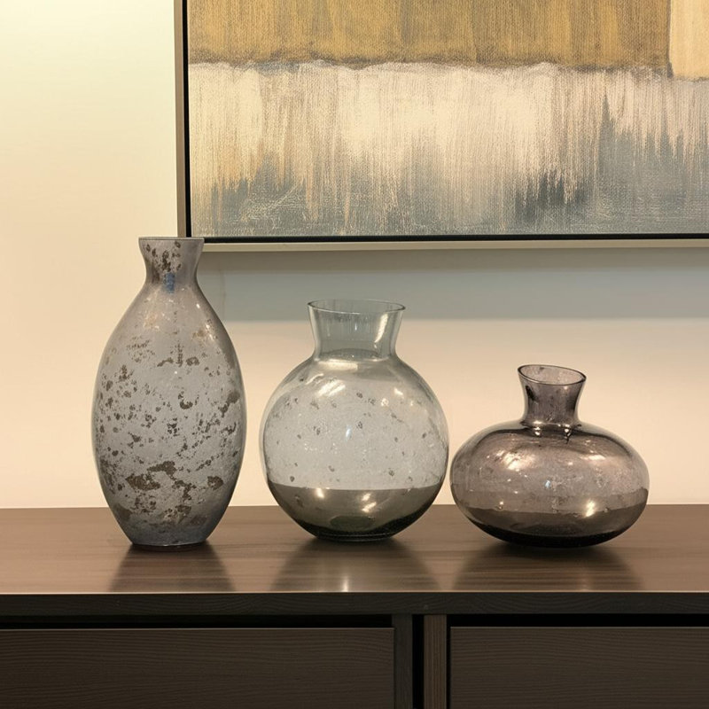 Ensemble de trois vases de table en verre bleu et gris