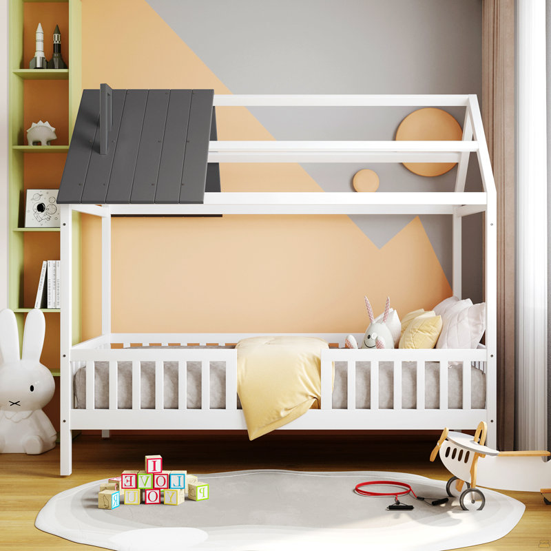 Lit simple en bois avec clôture