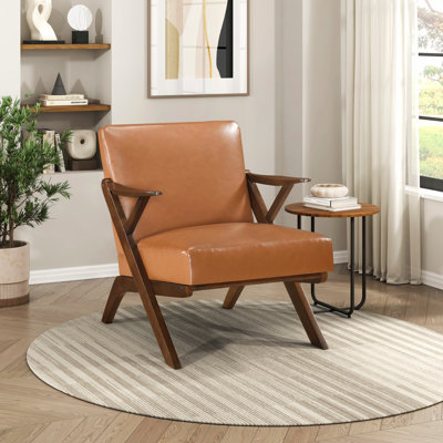 Élégante chaise d'appoint en similicuir brun avec structure en bois d'hévéa massif pour une assise confortable et un décor de salon élégant