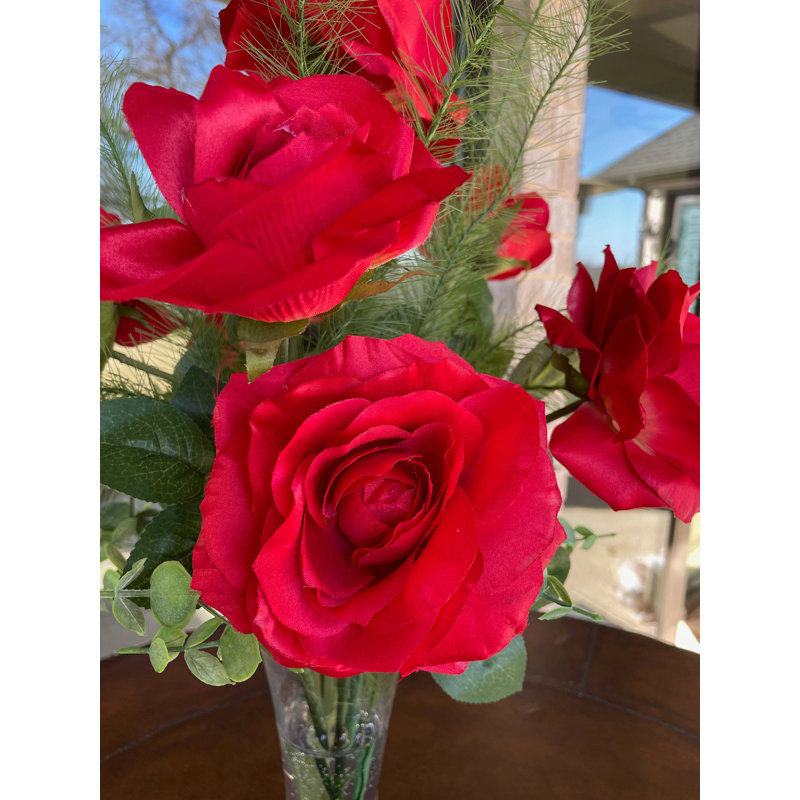 Arrangement de roses Siete dans un vase