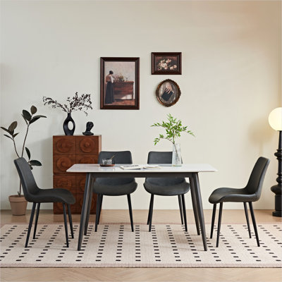 Table de salle à manger rectangulaire pour 4 personnes avec plateau en céramique et base en fer, style minimaliste moderne, blanc doux