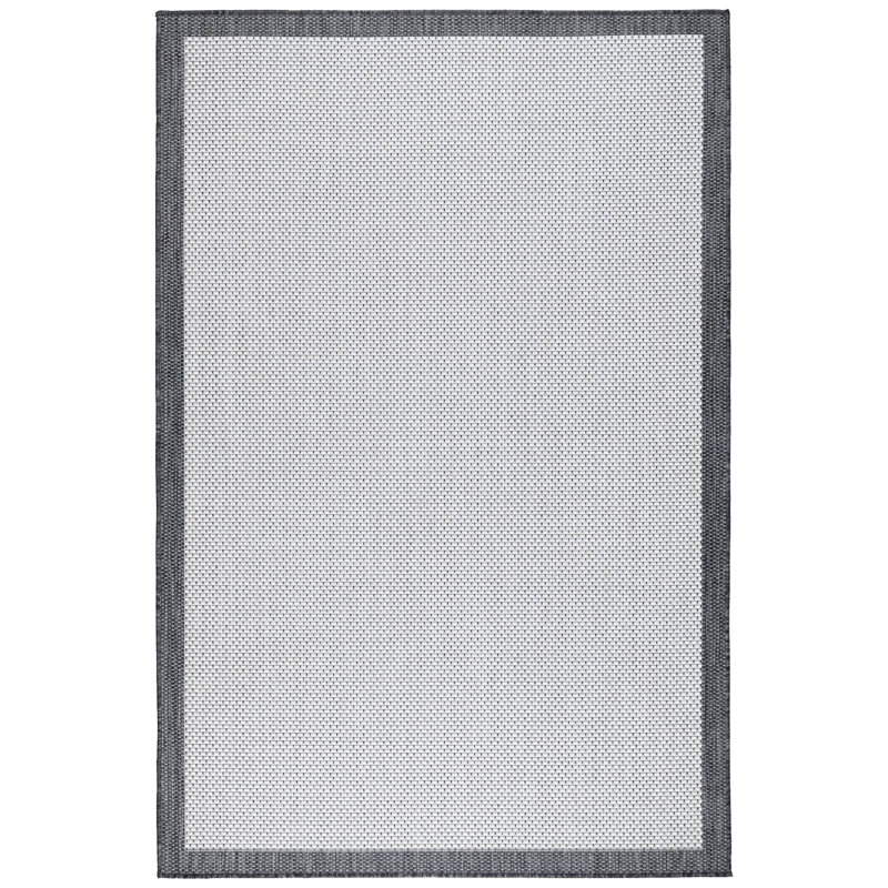 Renarta Machine Made Indoor / Outdoor Area Rug, Rectangle 6'6" x 9'6"