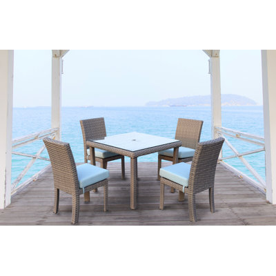 Losey 4 - Person Wicker Patio Dining Set with Square Table