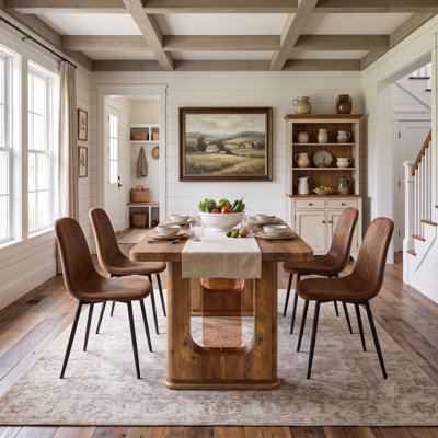 Ensemble de table de salle à manger élégant avec chaises rembourrées en similicuir