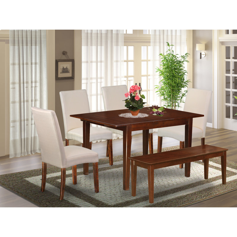 L'ensemble de table de salle à manger 6 pièces contient une table de cuisine rectangulaire avec feuille papillon et 4 chaises Parson en lin crème avec banc, acajou