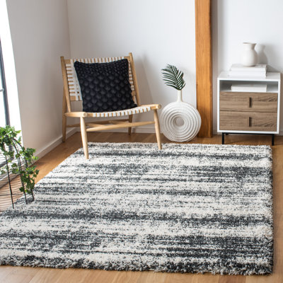 Tapis abstrait ivoire / gris