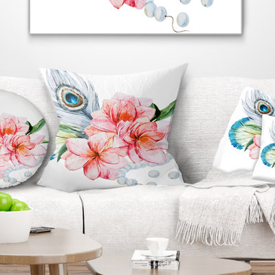 Coussin floral avec plumes de paon