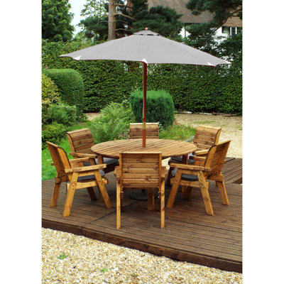 Faust 6 - Person Wood Patio Dining Set with Round Table , Cushions Included