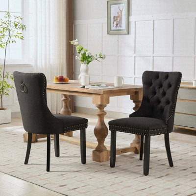 Ensemble de 2 chaises de salle à manger modernes et haut de gamme en lin massif et capitonné avec pieds en bois et garniture cloutée