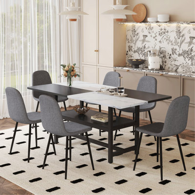 Ensemble de table et de chaises 71 x 35,4 pouces avec table de salle à manger épissée blanche et noire avec fonction de rangement au milieu des pieds de la table.