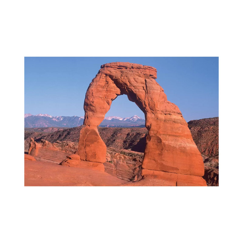 Delicate Arch And La Sal Mountains, Arches National Park by Tim Fitzharris - Wrapped Canvas Print