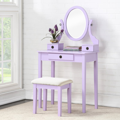 Coiffeuse en bois violet avec tabouret rembourré, miroir et rangement à 3 tiroirs. Style moderne et 3 positions réglables.