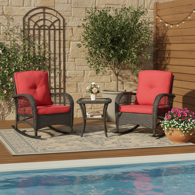 Three-Piece Set Of Wooden Outdoor Rocking Chairs For Two People With Red Cushions